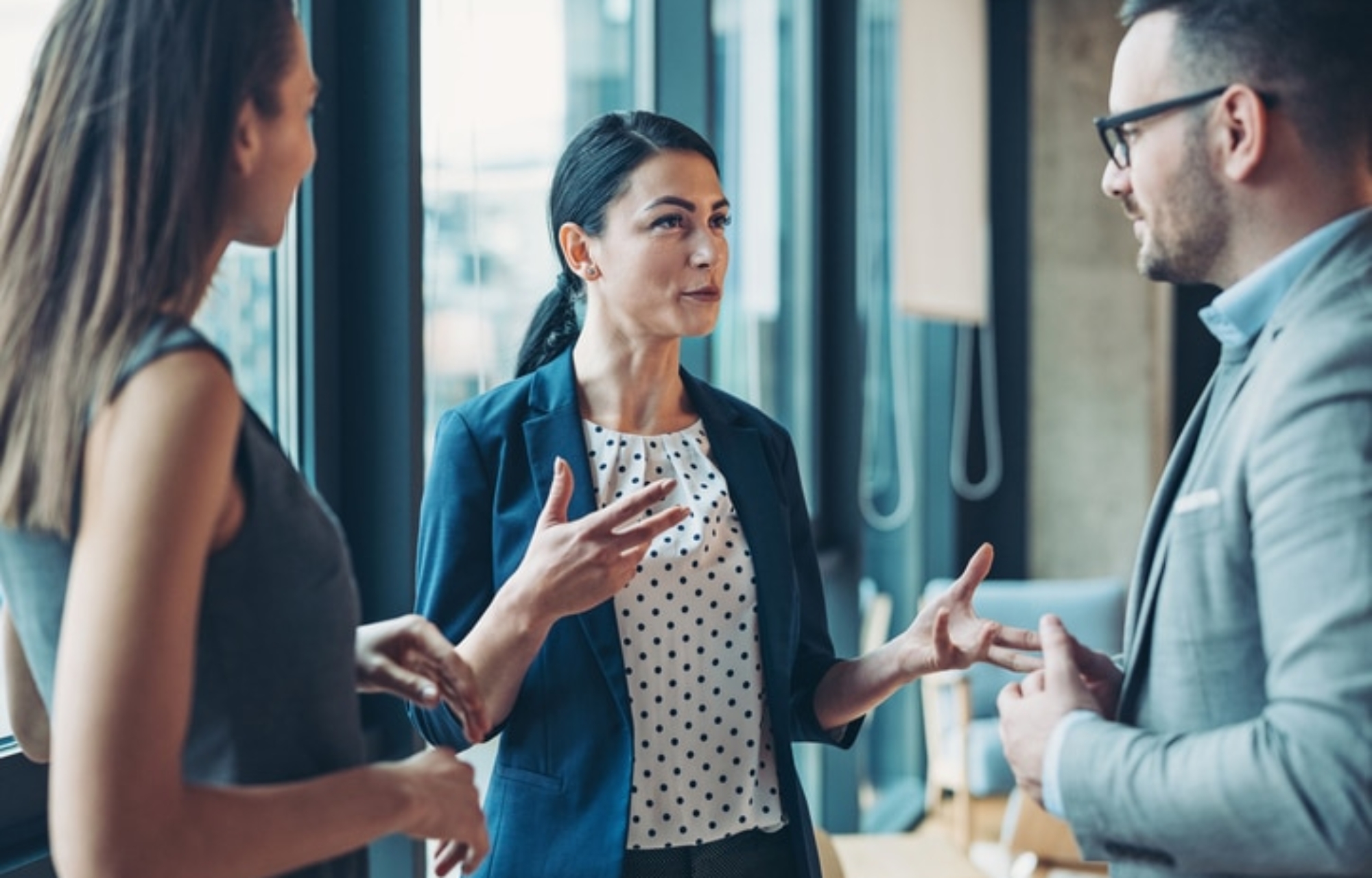 Business professionals talking about ERP