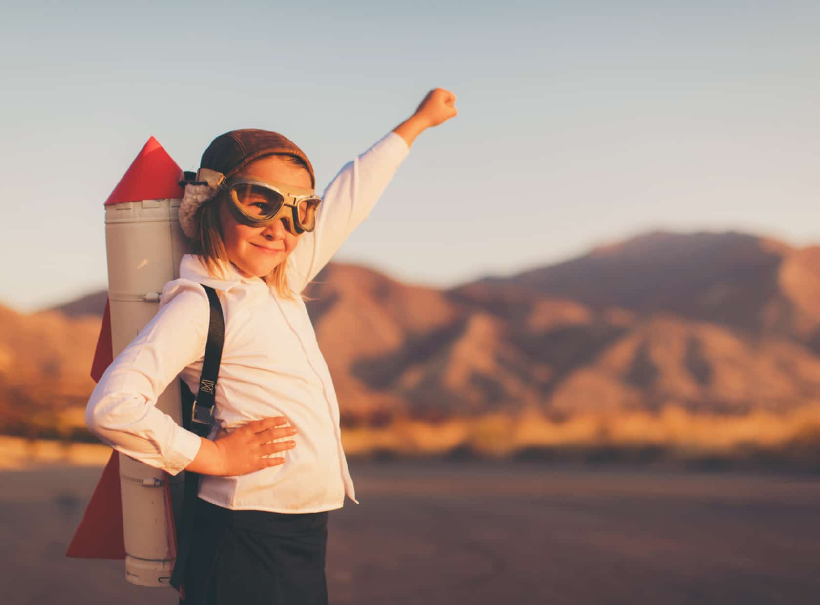 Young Business Girl with Rocket Pack