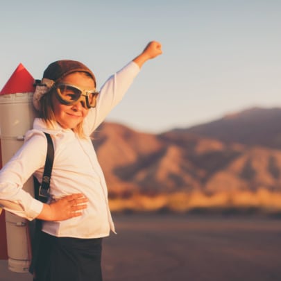 Young Business Girl with Rocket Pack